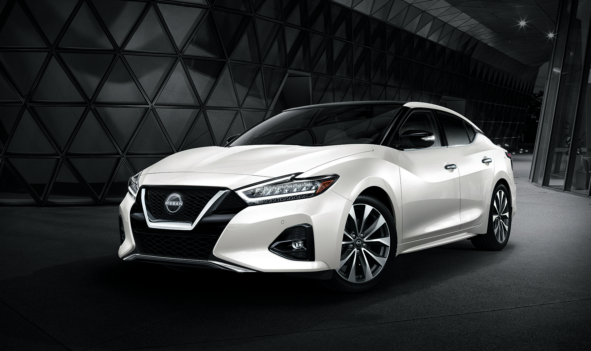 2023 nissan maxima white parked, front grill view